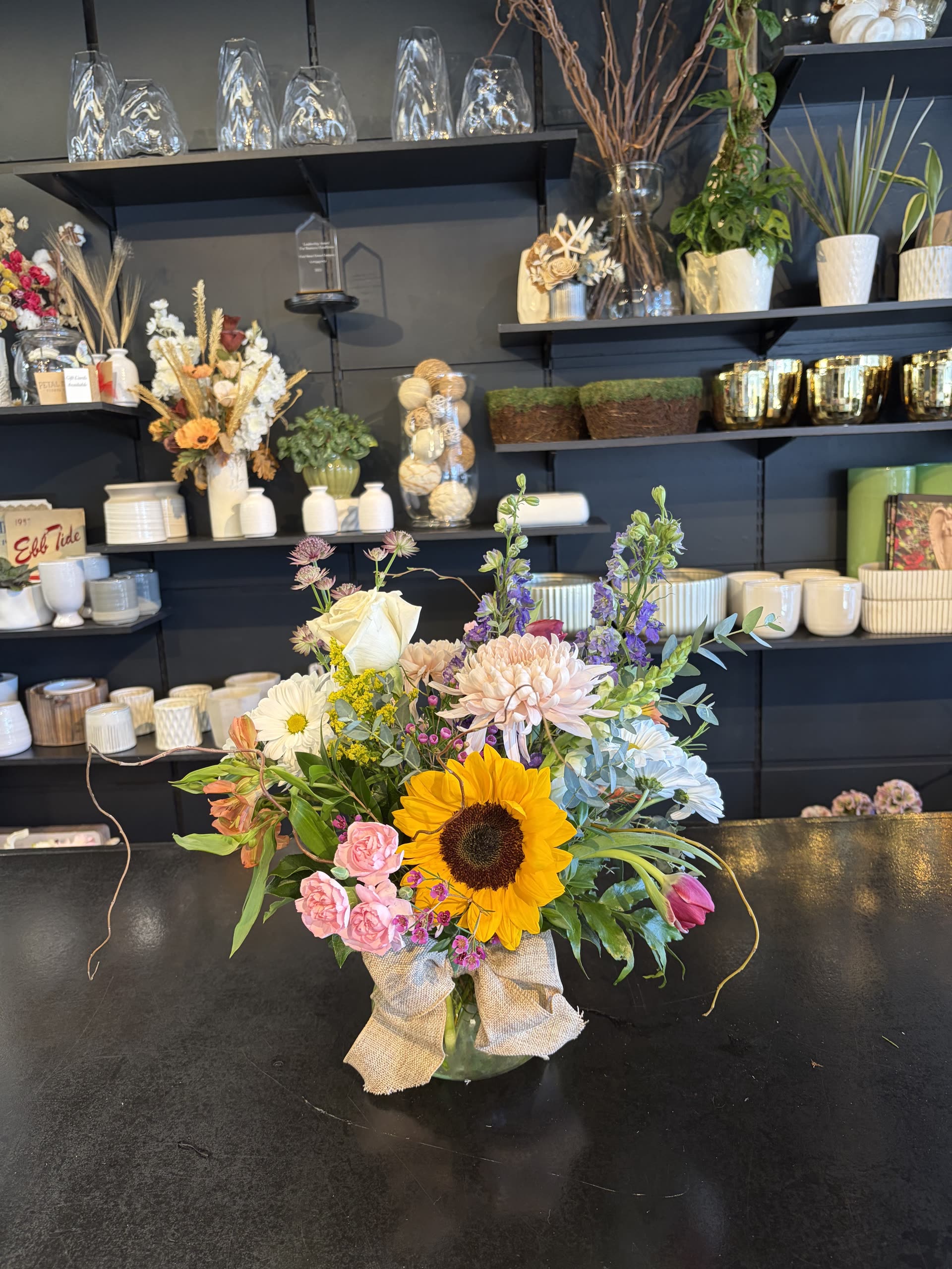 Garden mix — carnations, sunflowers, tulips, mums, and daisies